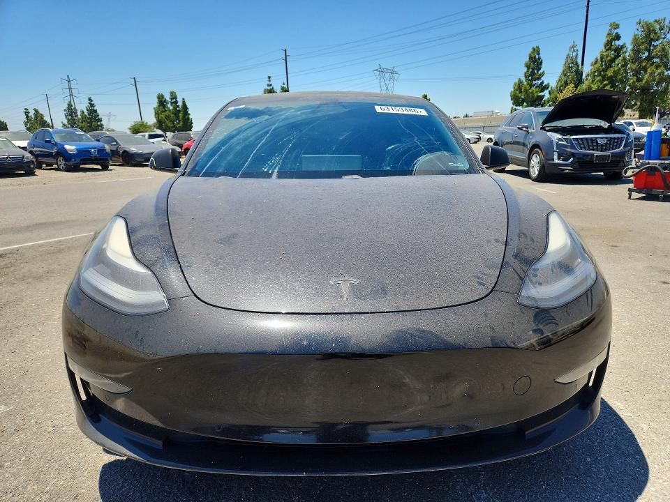 Photo 5 from auction – 2021 TESLA MODEL 3 with VIN 5YJ3E1EB7MF060170