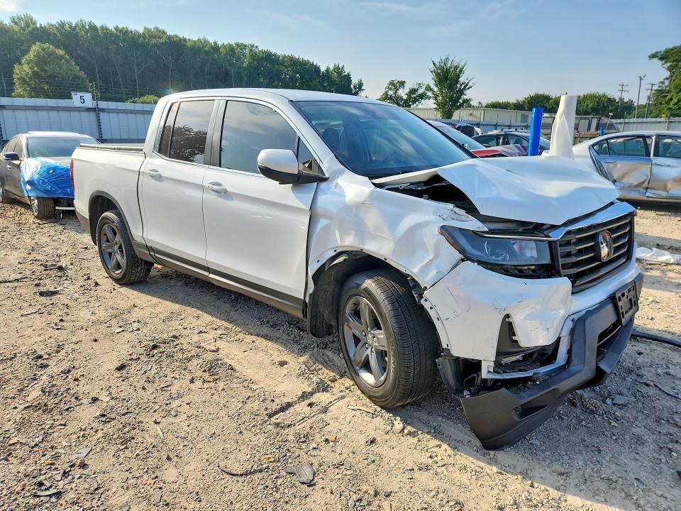 Photo 4 from auction – 2022 HONDA RIDGELINE with VIN 5FPYK3F50NB029578