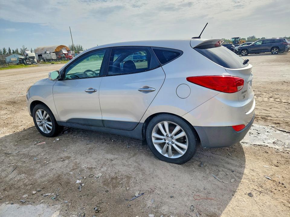 Photo 2 from auction – 2010 HYUNDAI TUCSON with VIN KM8JUCAC9AU021633