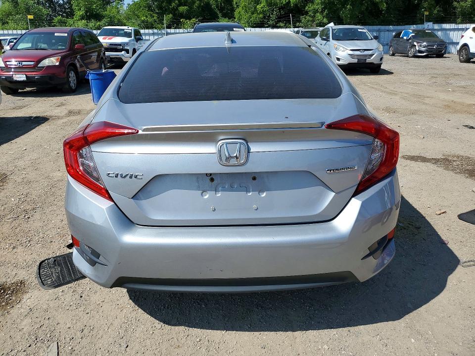 Photo 6 from auction – 2017 HONDA CIVIC with VIN 2HGFC1F9XHH102623