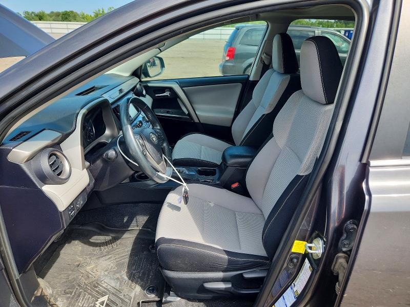 Photo 7 from auction – 2018 TOYOTA RAV4 with VIN 2T3RFREV7JW701940