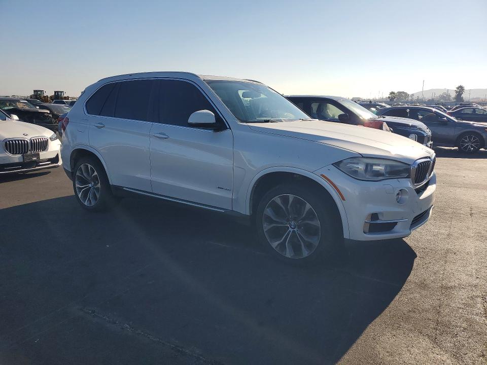 Photo 4 from auction – 2014 BMW X5 with VIN 5UXKR0C5XE0K50471