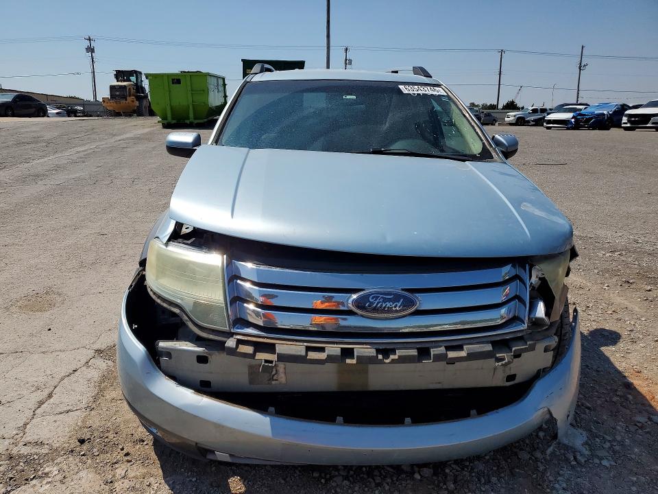 Photo 5 from auction – 2008 FORD TAURUS X with VIN 1FMDK05W18GA38750