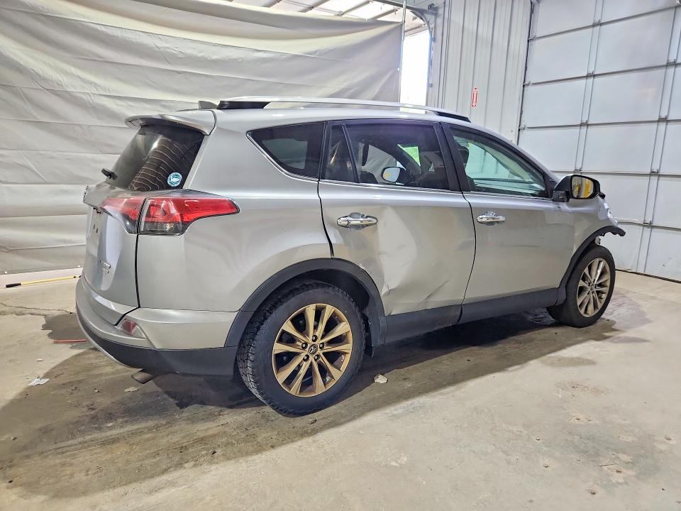 Photo 3 from auction – 2018 TOYOTA RAV4 with VIN 2T3DFREV0JW825395