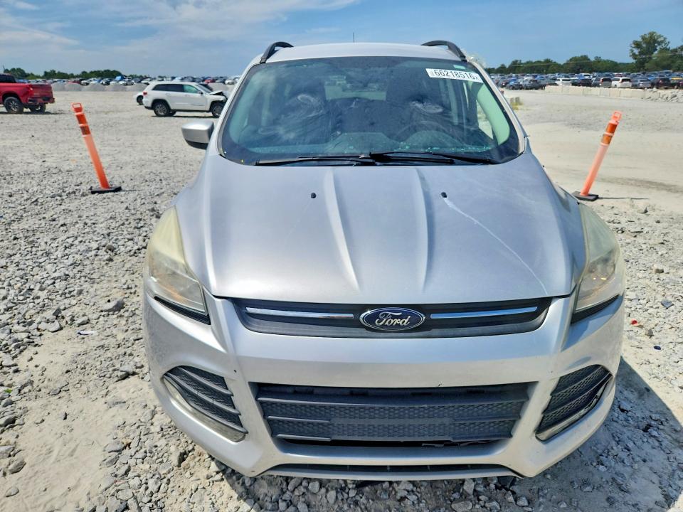 Photo 5 from auction – 2015 FORD ESCAPE with VIN 1FMCU0GX4FUA94935
