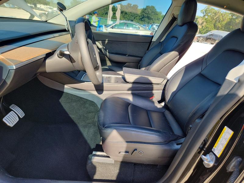 Photo 7 from auction – 2021 TESLA MODEL Y with VIN 5YJYGDEF8MF227091