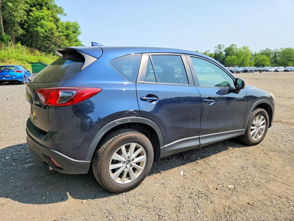 Photo 3 from auction – 2016 MAZDA CX-5 with VIN JM3KE4CYXG0762353