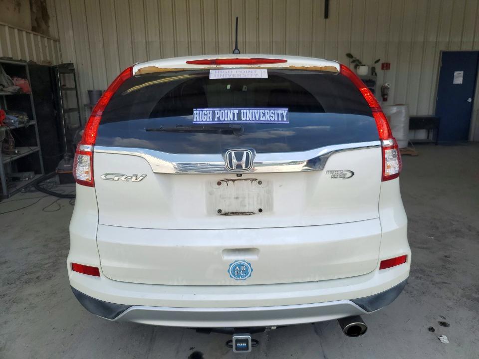 Photo 6 from auction – 2015 HONDA CR-V with VIN 5J6RM3H54FL009282