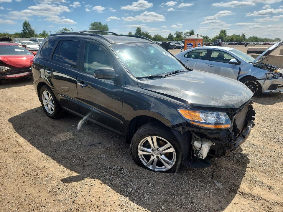 Photo 4 from auction – 2011 HYUNDAI SANTA FE with VIN 5XYZK3AB6BG090366