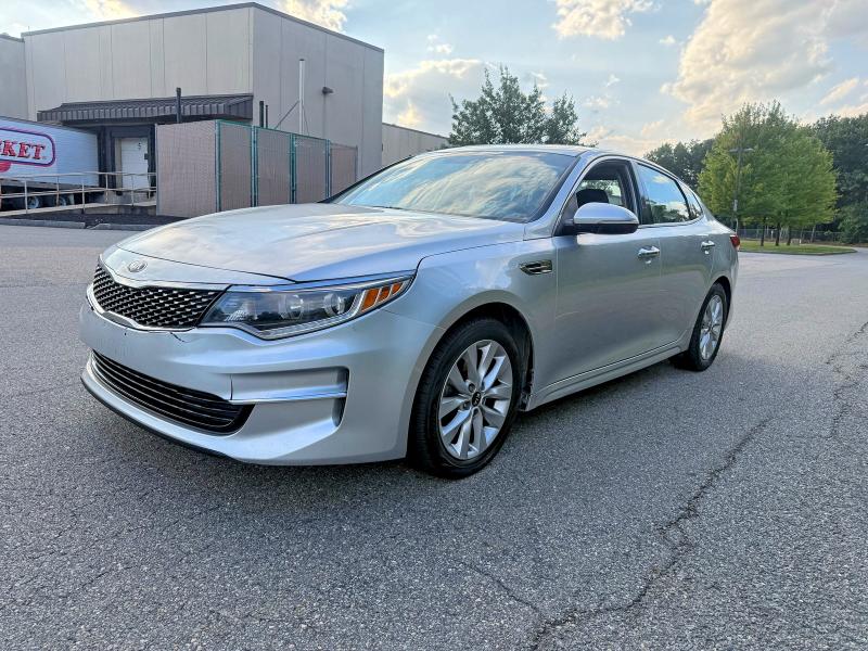 KIA OPTIMA EX 2018 with VIN 5XXGU4L36JG206570 - Photo from auction