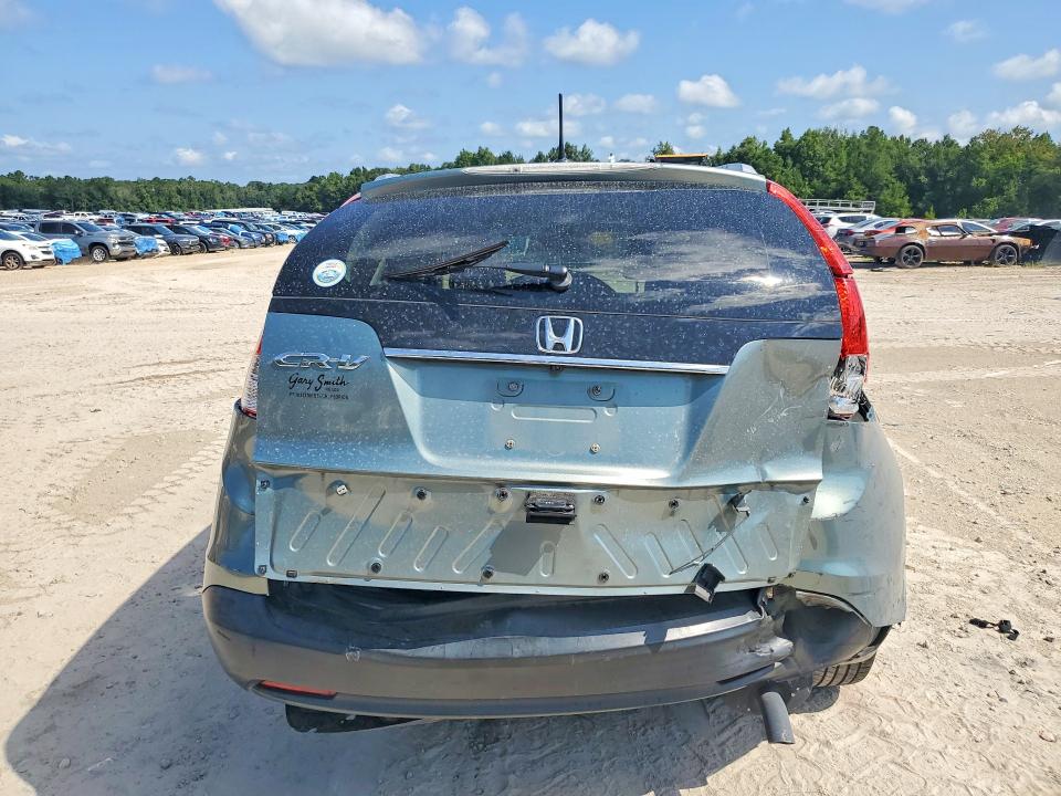 Photo 6 from auction – 2012 HONDA CR-V with VIN 2HKRM3H72CH513613