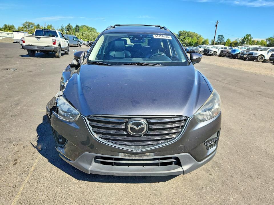 Photo 5 from auction – 2016 MAZDA CX-5 with VIN JM3KE4DY8G0752127