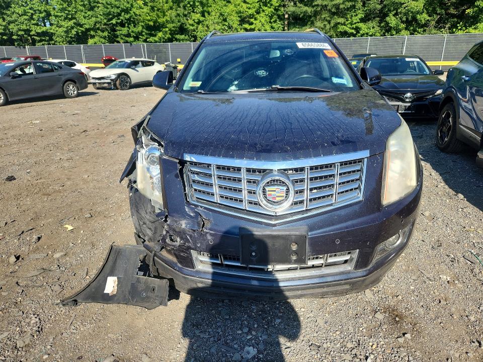 Снимка 5 от търг – 2015 CADILLAC SRX с VIN 3GYFNCE34FS623035
