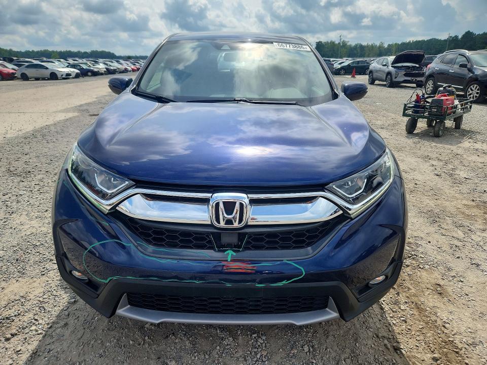 Photo 5 from auction – 2017 HONDA CR-V with VIN 2HKRW1H81HH503945
