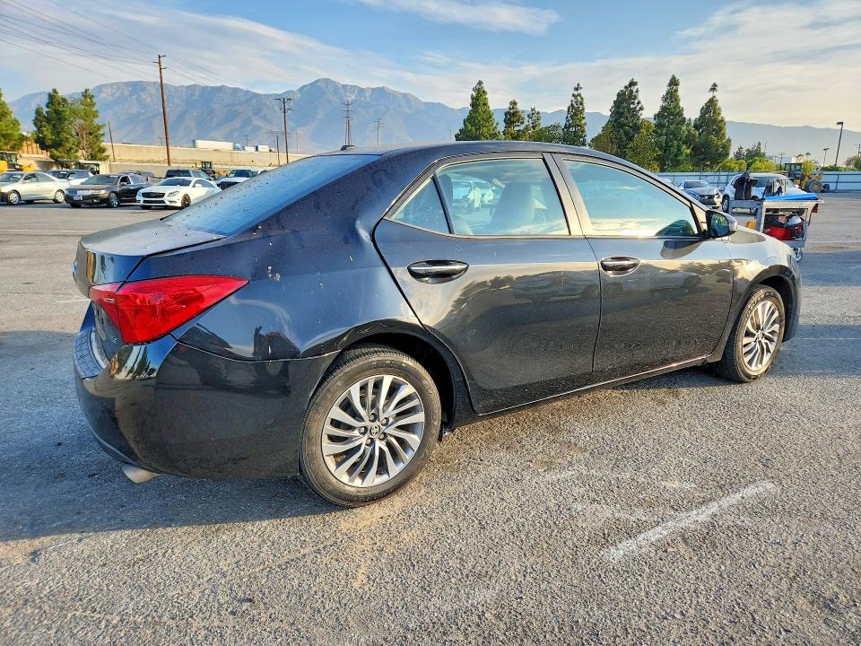 Photo 3 from auction – 2018 TOYOTA COROLLA with VIN 5YFBURHE1JP816319