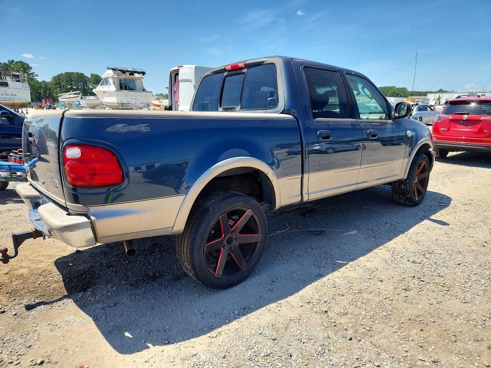 Foto 3 de la subasta – 2003 FORD F150 con VIN 1FTRW08L83KC23559