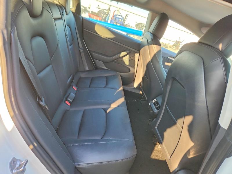 Снимка 10 от търг – 2023 TESLA MODEL 3 с VIN 5YJ3E1EA9PF410720