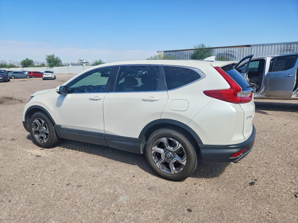 Photo 2 from auction – 2017 HONDA CR-V with VIN 2HKRW2H55HH668893