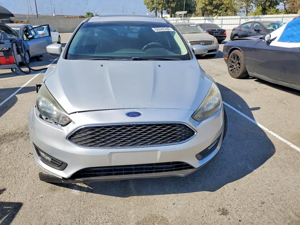 Снимка 5 от търг – 2017 FORD FOCUS с VIN 1FADP3M21HL290419