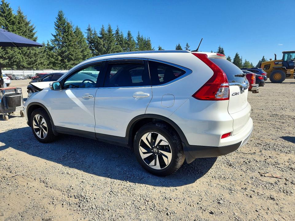 Photo 2 from auction – 2016 HONDA CR-V with VIN 5J6RM4H90GL118767