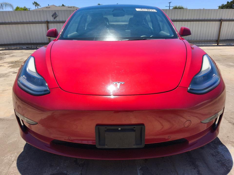 Photo 5 from auction – 2022 TESLA MODEL 3 with VIN 5YJ3E1EB2NF305054