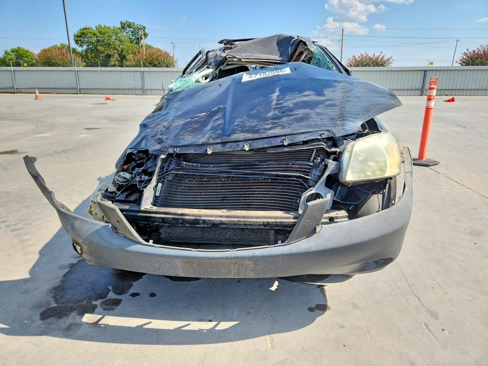 Photo 5 from auction – 2005 MAZDA TRIBUTE with VIN 4F2YZ02Z95KM54750
