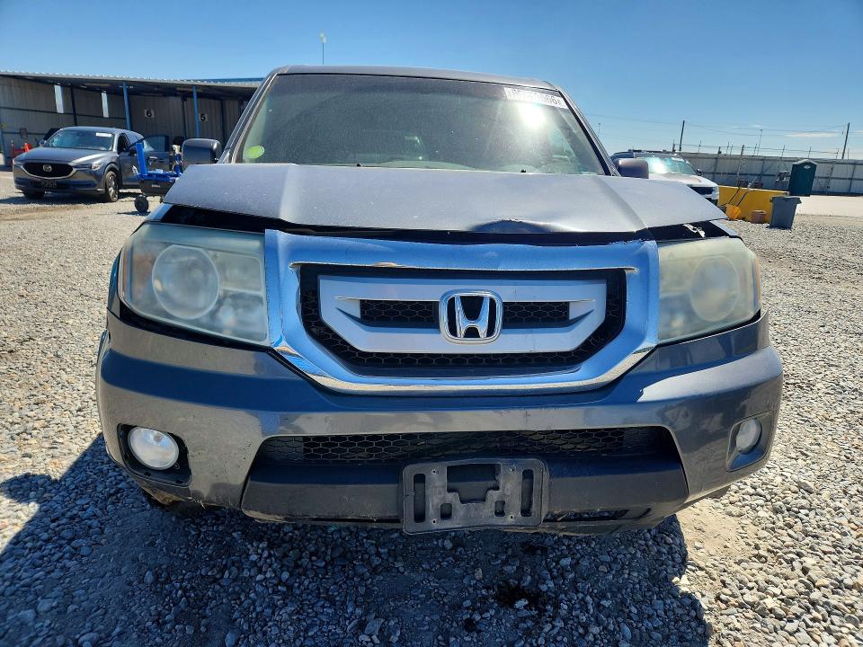 Снимка 5 от търг – 2011 HONDA PILOT с VIN 5FNYF4H52BB022708