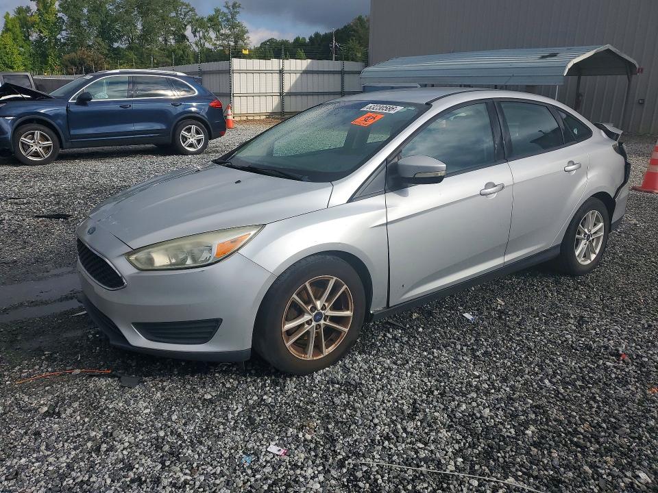 FORD FOCUS 2016 with VIN 1FADP3F24GL320332 - Photo from auction