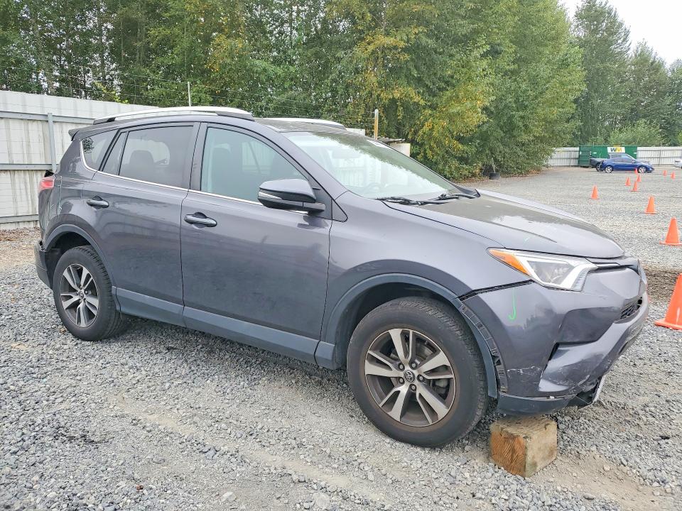 Photo 4 from auction – 2016 TOYOTA RAV4 with VIN 2T3WFREV6GW255856