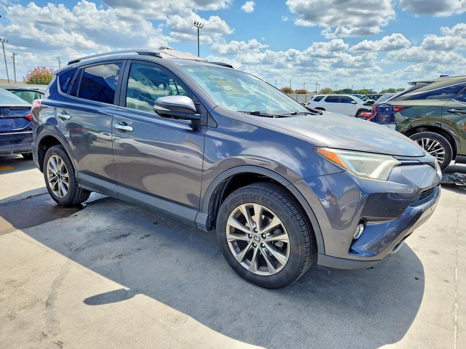 Photo 4 from auction – 2017 TOYOTA RAV4 with VIN JTMYFREV1HJ116727