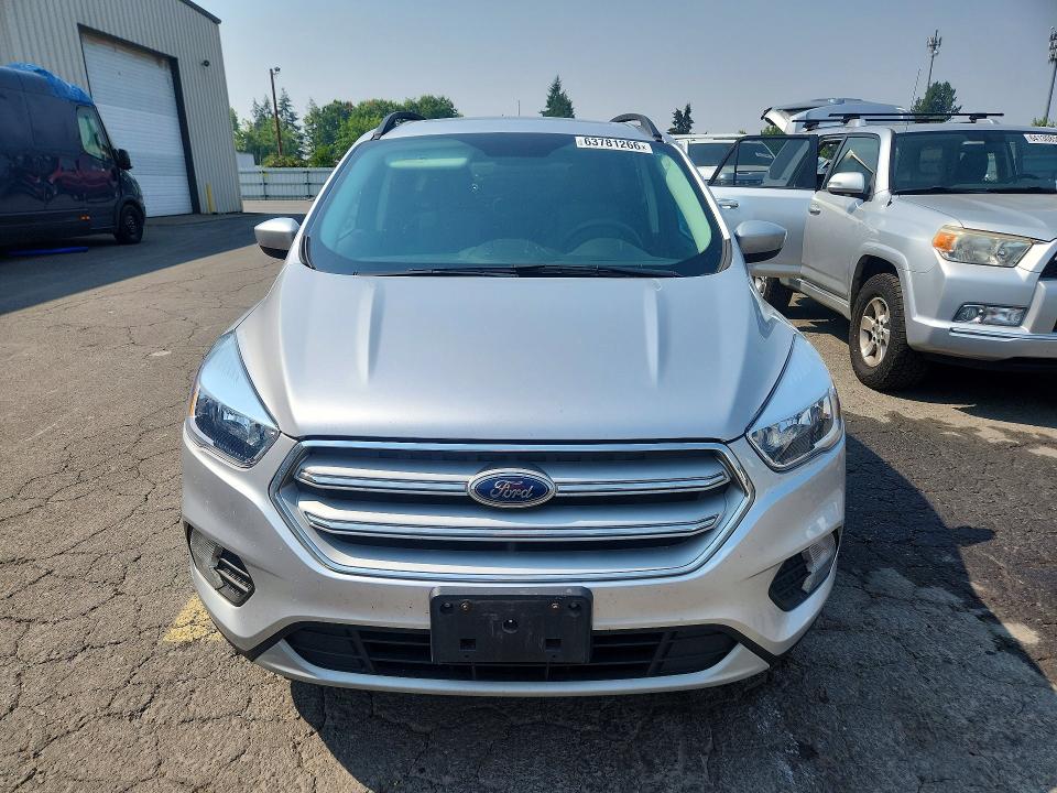 Photo 5 from auction – 2018 FORD ESCAPE with VIN 1FMCU9GD7JUC60948