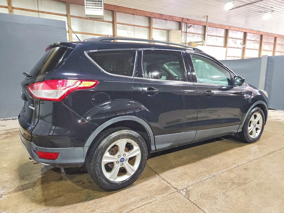 Снимка 3 от търг – 2016 FORD ESCAPE с VIN 1FMCU0GX2GUC77414