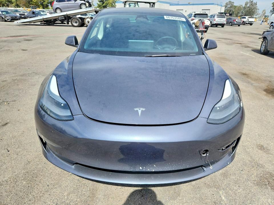 Photo 5 from auction – 2023 TESLA MODEL 3 with VIN 5YJ3E1EA8PF545641