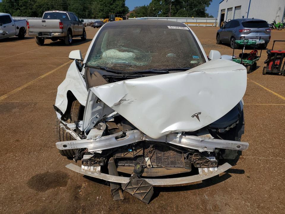 Photo 5 from auction – 2021 TESLA MODEL 3 with VIN 5YJ3E1EB0MF980030