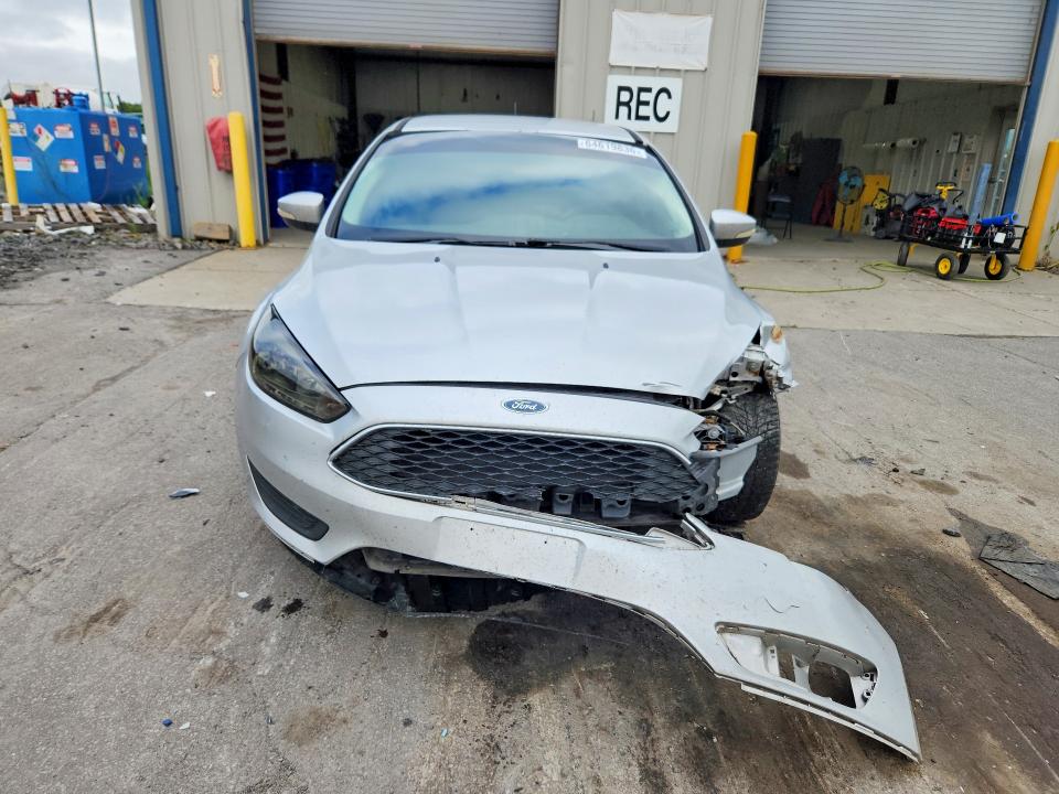 Photo 5 from auction – 2016 FORD FOCUS with VIN 1FADP3F23GL381316