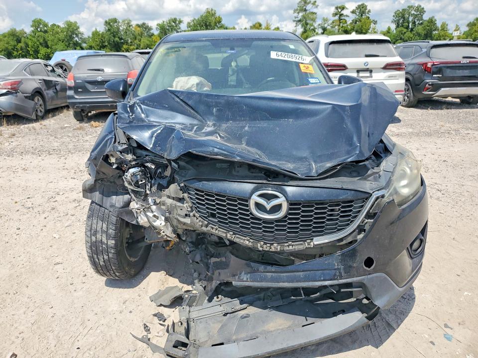 Photo 5 from auction – 2014 MAZDA CX-5 with VIN JM3KE2CY2E0326792