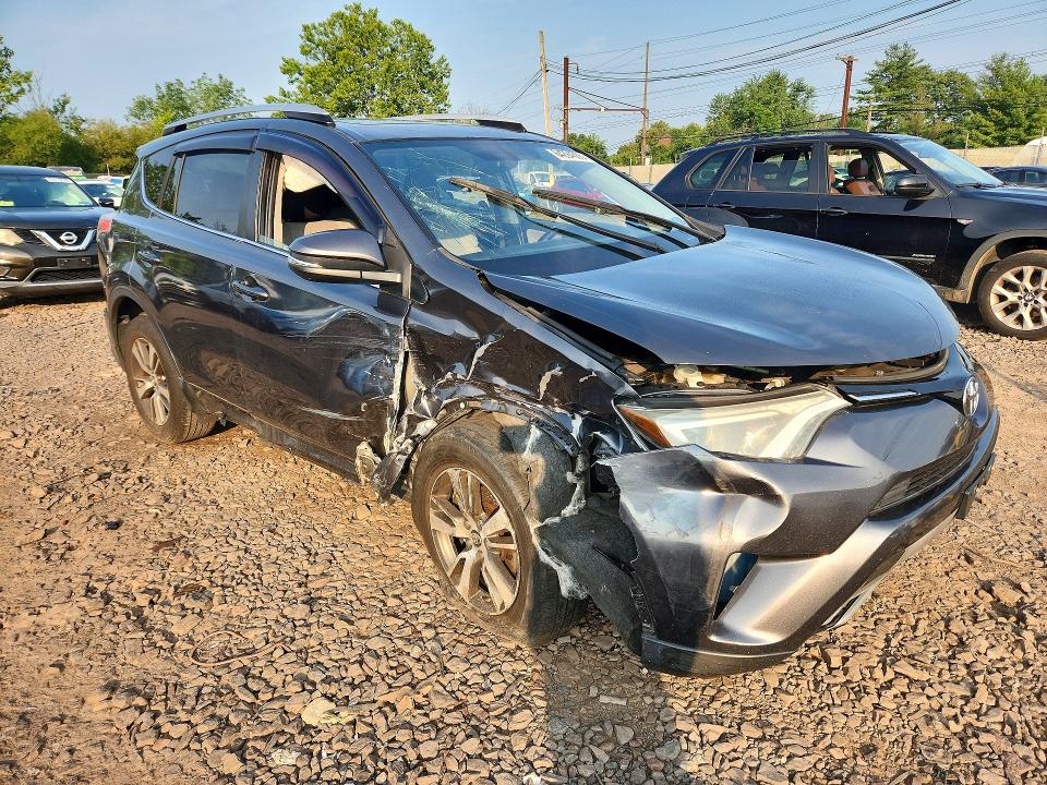 Photo 4 from auction – 2016 TOYOTA RAV4 with VIN JTMWFREV7GD085729