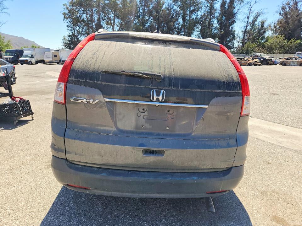 Photo 6 from auction – 2013 HONDA CR-V with VIN 2HKRM3H71DH523292