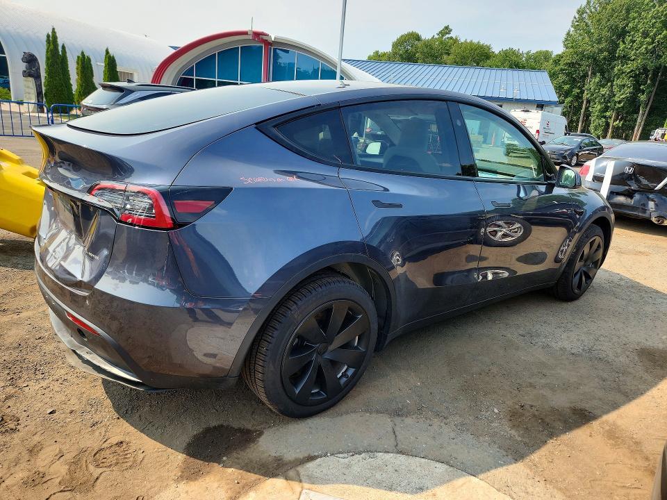 Photo 3 from auction – 2023 TESLA MODEL Y with VIN 7SAYGDEE2PA173721