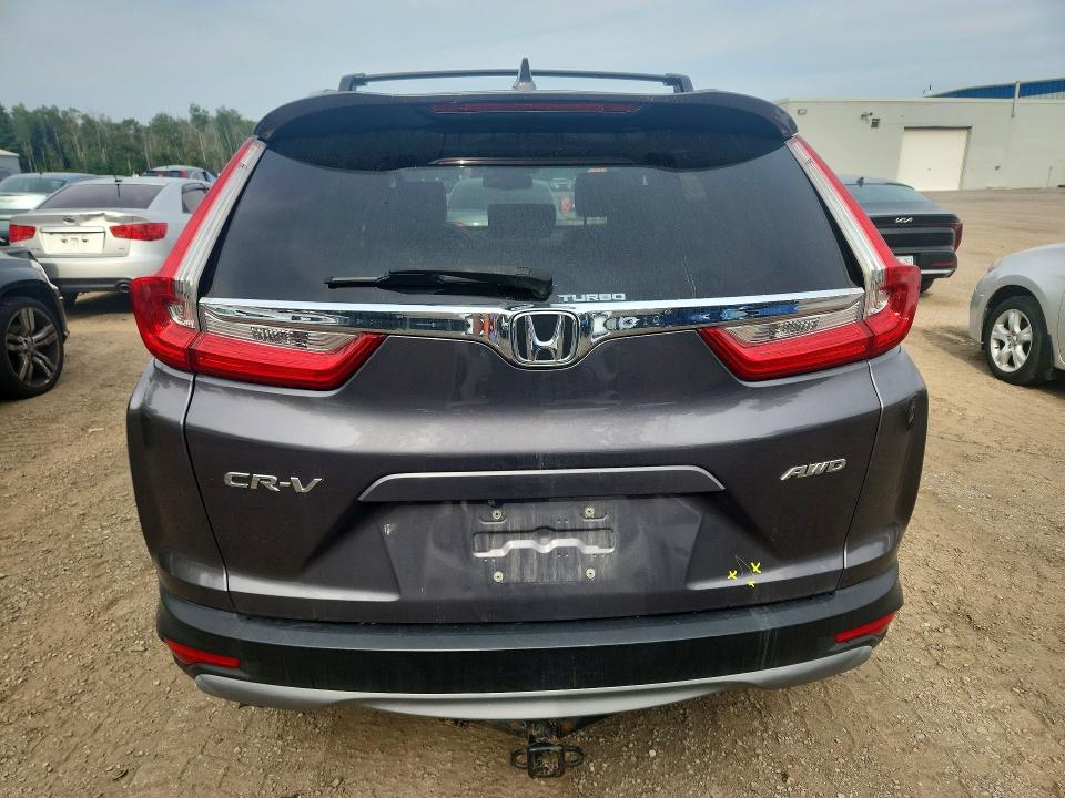 Photo 6 from auction – 2018 HONDA CR-V with VIN 2HKRW2H8XJH112465