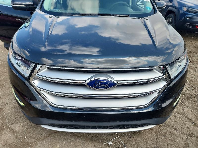 Photo 12 from auction – 2015 FORD EDGE with VIN 2FMTK3J90FBB12094