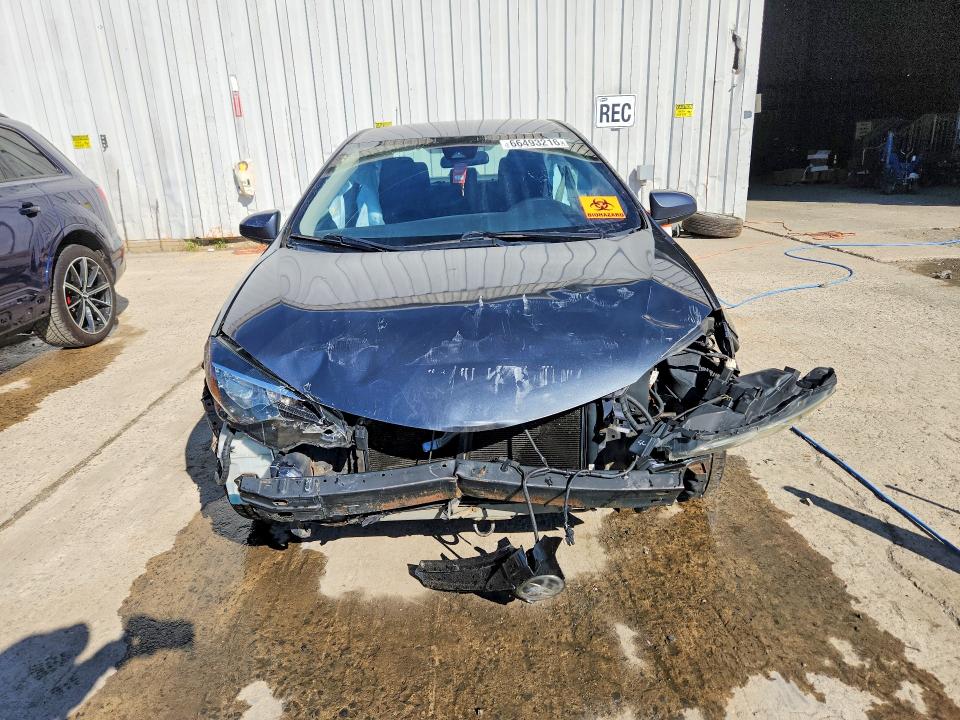Photo 5 from auction – 2018 TOYOTA COROLLA with VIN 2T1BURHE3JC975553