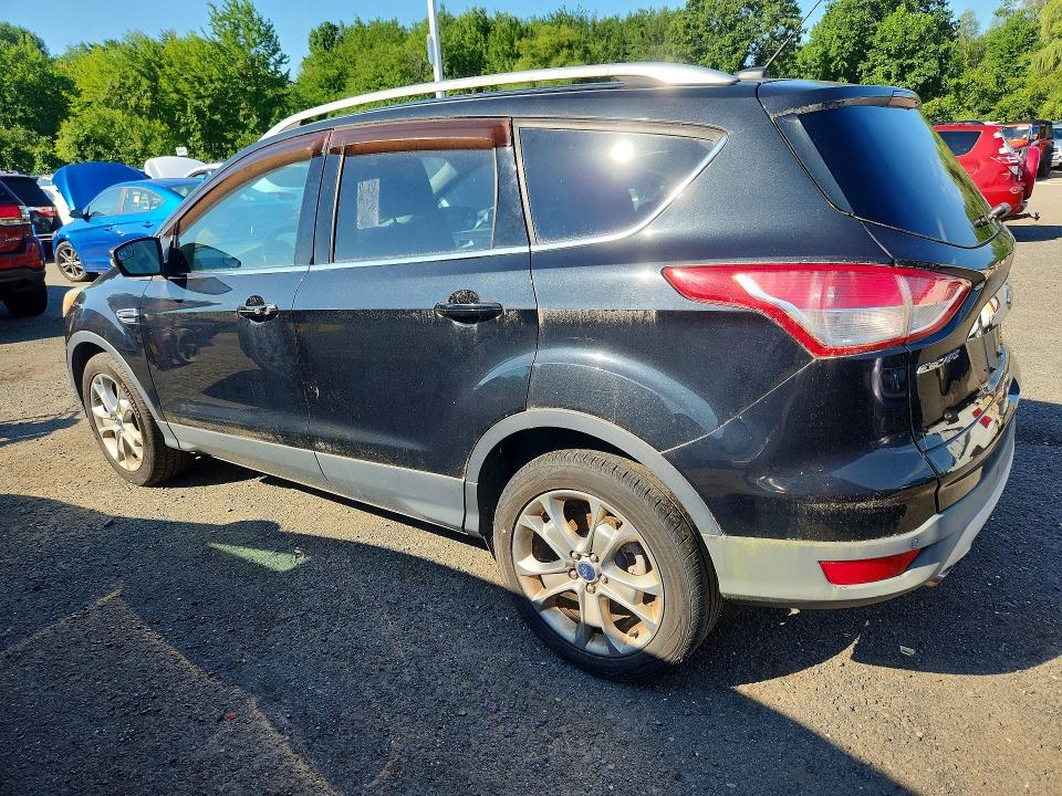 Photo 2 from auction – 2014 FORD ESCAPE with VIN 1FMCU9JX4EUC41301