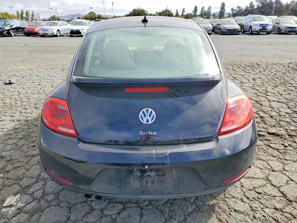Photo 6 from auction – 2016 VOLKSWAGEN BEETLE with VIN 3VWJ17AT5GM615053