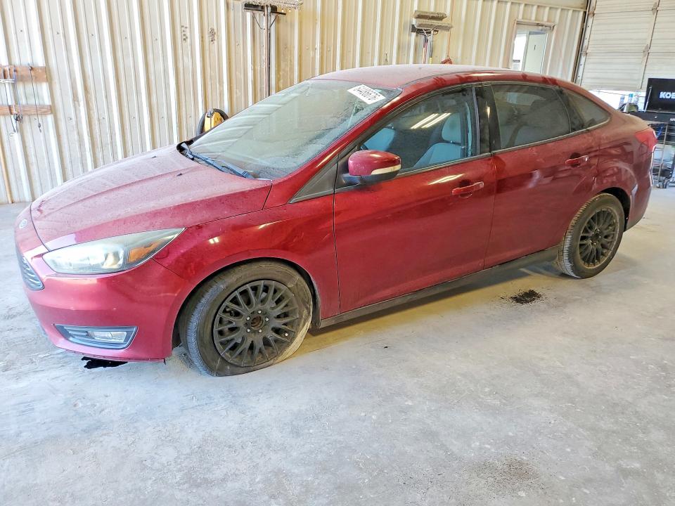 FORD FOCUS 2016 con VIN 1FADP3FE4GL234464 - Foto de la subasta