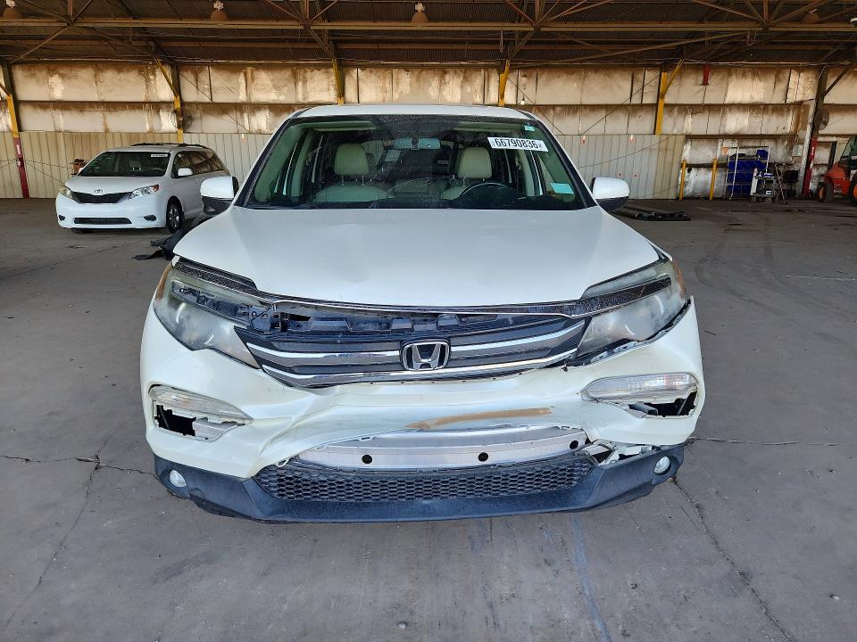 Photo 5 from auction – 2016 HONDA PILOT with VIN 5FNYF5H51GB027394