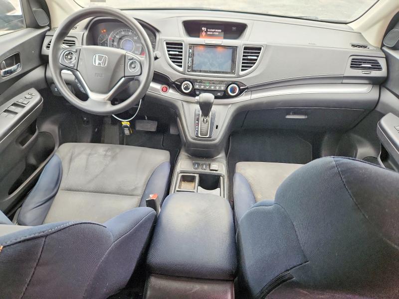 Photo 8 from auction – 2015 HONDA CR-V with VIN 2HKRM4H50FH705301
