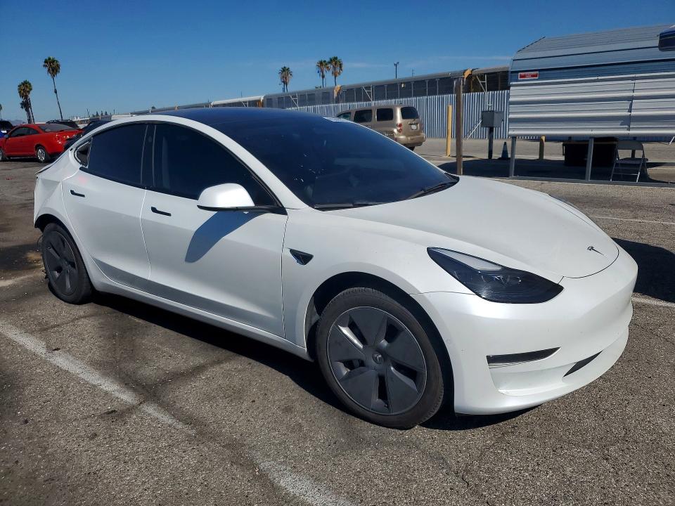 Photo 4 from auction – 2022 TESLA MODEL 3 with VIN 5YJ3E1EA8NF134947