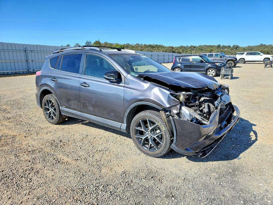 Photo 4 from auction – 2018 TOYOTA RAV4 HV with VIN JTMJJREV4JD163528