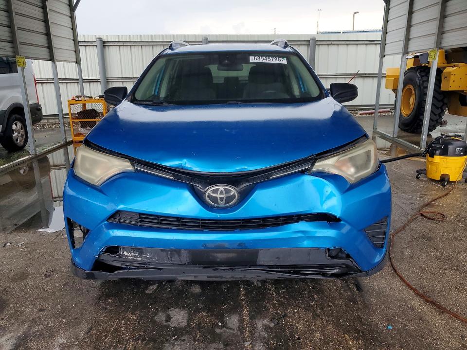 Photo 5 from auction – 2018 TOYOTA RAV4 with VIN JTMZFREV3JJ726834